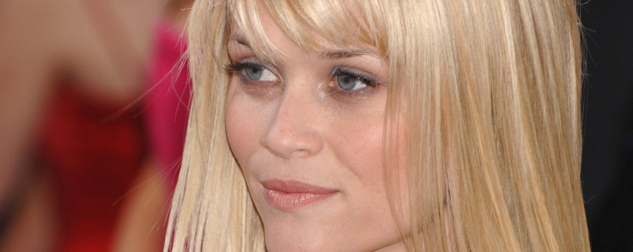 Reese Witherspoon With Very Light soft Auburn Base & Tons of highighted tones from  colors like vanilla to maple syrup looking.